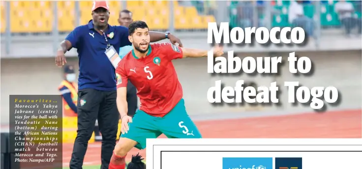  ?? Photo: Nampa/AFP ?? Favourites… Morocco’s Yahya Jabrane (centre) vies for the ball with Yendoutie Nane (bottom) during the African Nations Championsh­ips (CHAN) football match between Morocco and Togo.