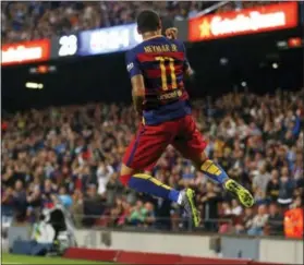  ?? MANU FERNANDEZ — THE ASSOCIATED PRESS ?? Barcelona’s Neymar reacts after scoring against Rayo Vallecano on Saturday.