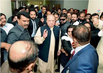  ?? AP ?? Deposed prime minister Nawaz Sharif arrives at the anti-corruption court in Islamabad on Tuesday. Sharif made his first appearance before the court to face corruption charges. —