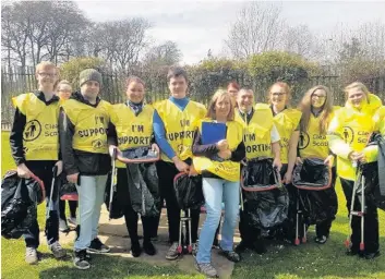  ??  ?? Spring clean The McDonald’s team joined in collecting litter in Livingston