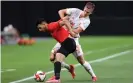  ?? Photograph: Masashi Hara/Getty Images ?? Dani Olmo, another of the Spain Euro 2020 squad playing at the Olympics, battles with Ahmed Fotouh.