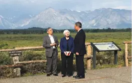  ?? Associated Press ?? n Federal Reserve Chair Janet Yellen talks Friday with Mario Draghi, head of the European Central Bank, and Haruhiko Kuroda, head of the Bank of Japan, during a break at the central bankers conference at Jackson Hole, Wyo. The conference, in its 41st...