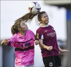  ??  ?? Aimee Bates-Crosbie in a heading duel with Saoirse Healey.