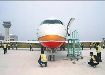  ?? XINHUA ?? China’s first homegrown regional jetliner ARJ21-700, which is produced by the Commercial Aircraft Corporatio­n of China, is delivered to Chengdu Airlines on Thursday.