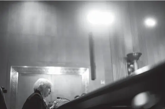  ?? Jabin BOTSFORD/THE Washington Post ?? Treasury Secretary Janet L. Yellen testifies during a Senate Finance Committee hearing on Thursday. “I think we need to look into the regulators,” she told lawmakers.