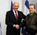  ?? (Reuters) ?? EHUD BARAK and Ehud Olmert in happier times.