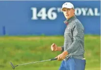  ?? THE ASSOCIATED PRESS ?? British Open leader Jordan Spieth celebrates on the 18th green after finishing his third round Saturday at Royal Birkdale. He shot a 65.