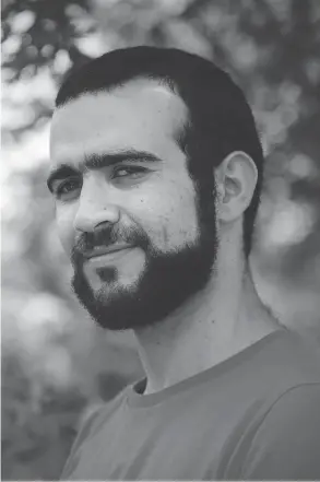  ?? COLIN PERKEL / THE CANADIAN PRESS ?? Former Guantanamo Bay prisoner Omar Khadr, 30, pictured Thursday in Mississaug­a, Ont., has reportedly received $10.5 million from the federal government. The federal government formally apologized to Omar Khadr on Friday, and reportedly paid out a...