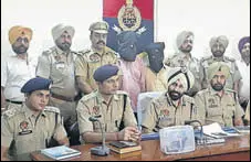  ?? HT PHOTO ?? The accused in police custody in Ludhiana on Friday.