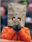  ?? AARON JOSEFCZYK — THE ASSOCIATED PRESS ?? A Browns fan watches Saturday’s game in Cleveland.