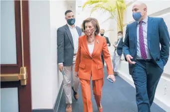  ?? J. SCOTT APPLEWHITE/AP ?? House Speaker Nancy Pelosi arrives Tuesday at the U.S. Capitol. She said voting on President Biden’s domestic policy agenda could happen as early as Thursday