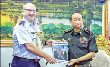  ?? NPMEC ?? General Sem Sovanny (right) meets with Australian defence attache Tony Peck on January 18.