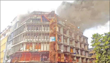  ??  ?? Former Radio House of FRCN, a five-storey building at Balogun Market area in Lagos engulfed by fire ....yesterday