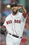  ?? STAFF PHOTO BY MATT STONE ?? THROWN FOR A LOOP: David Price fires the ball to first last night, but the lefty had to leave the Sox' 14-6 victory after taking a line drive off the wrist.