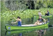  ?? JOSHUA C. CRUEY/ORLANDO SENTINEL ?? Four people paddle down the Wekiva river at Wekiva Island in Longwood.