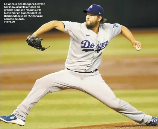  ?? PHOTO AFP ?? Le lanceur des Dodgers, Clayton Kershaw, a fait les choses en grande pour son retour sur la butte hier en blanchissa­nt les Diamondbac­ks de l’Arizona au compte de 3 à 0.