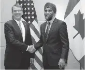  ?? VIRGINIA MAYO / THE ASSOCIATED PRESS ?? The meeting between Defence Minister Harjit Sajjan and U.S. Secretary of Defence Ash Carter comes as Canada faces criticism over its withdrawal of CF-18 fighter jets.