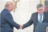  ?? Andrew Harnik, The Associated Press ?? President Donald Trump, left, shakes hands with Attorney General William Barr, right, on Sept. 9 at the White House in Washington.