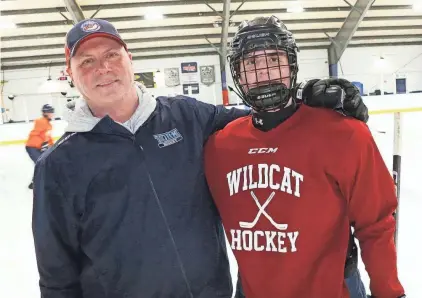  ?? PHOTOS BY DEB CRAM ?? York High School boys hockey coach Pete Douris, left, and his son, Luke, a senior, are seen at Wednesday’s practice at Jackson’s Landing in Durham. Pete played at UNH and went on to play 11 years in the NHL, and Luke is coming off a career-high five-goal game.