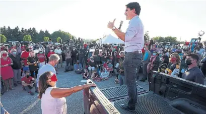  ?? SEAN KILPATRICK THE CANADIAN PRESS ?? Liberal Leader Justin Trudeau speaks at a tailgate party in Hamilton on Friday, as the election campaign enters its final weekend.
