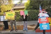  ?? Genaro Molina Los Angeles Times ?? A HANDFUL of protesters gather outside the home of county Supervisor Sheila Kuehl in Santa Monica.