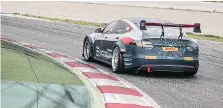  ?? ELECTRIC GT ?? A Tesla Model S race car built for the Electric Production Car Series (EPCS) running test laps for a series that could start this year.