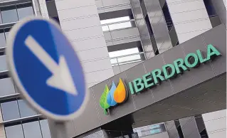 ?? AP PHOTO/ANDRES KUDACKI ?? This file photo shows the exterior of Spanish energy company Iberdrola in Madrid, Spain. Iberdrola’s majority-owned U.S. subsidiary Avangrid wants to acquire PNM Resources, the parent company of New Mexico’s largest electric utility, under a multibilli­on-dollar merger.