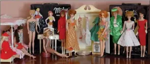  ??  ?? Vintage Barbies, from left: Skipper, Talking Barbie, Side Swirl Barbie, Ponytail Barbie, Midge, Twist Barbie, Bubble Cut Barbie, Stacey, and three more Bubble Cut Barbies.