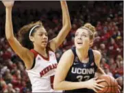  ?? NATI HARNIK - THE ASSOCIATED PRESS ?? UConn’s Katie Lou Samuelson (33), right, looks for a way around Nebraska’s Nicea Eliely during the first half of UConn’s win at Nebraska last week.