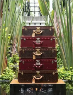  ??  ?? CASE BY CASE The Louis Vuitton trunks can also be customised to hold your favourite watches