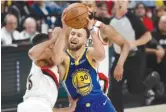  ?? GETTY IMAGES ?? Stephen Curry (above) and Draymond Green became the first teammates in NBA history to post tripledoub­les in the same playoff game.