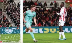  ?? Nathan Stirk/Getty Images ?? Evan Ferguson celebrates scoring in the first half for Brighton at Stoke. Photograph: