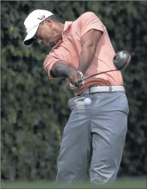  ?? Picture: REUTERS ?? DRIVING FORCE: Tiger Woods hits his tee shot on the second hole during a practise round in preparatio­n for the 2013 Masters golf tournament at the Augusta National Golf Club in Augusta, Georgia, which starts today.