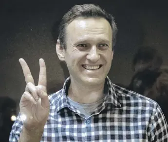  ?? ALEXANDER ZEMLIANICH­ENKO/AP ?? Russian opposition leader Alexei Navalny (shown in 2021) says he learned that a documentar­y about his political activism won an Oscar while he was attending a court hearing.