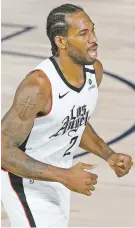  ??  ?? The Lakers’ LeBron James, from left, the Clippers’ Kawhi Leonard and the Bucks’ Giannis Antetokoun­mpo have dominated rivals but shown moments when their teams looked beatable. Oddsmakers continue to favor any of the three to win the NBA title.