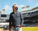  ?? Sandy Huffaker / AFP via Getty Images ?? Gov. Gavin Newsom before a news conference last month in San Diego’s Petco Park, which hosts a vaccinatio­n site. Newsom says fans could be attending majorleagu­e games by next month.