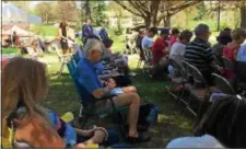  ?? KATHLEEN CAREY – DIGITAL FIRST MEDIA ?? People pause in a moment of prayer Thursday at Rose Tree Park as part of Delaware County’s National Day Of Prayer celebratio­n.