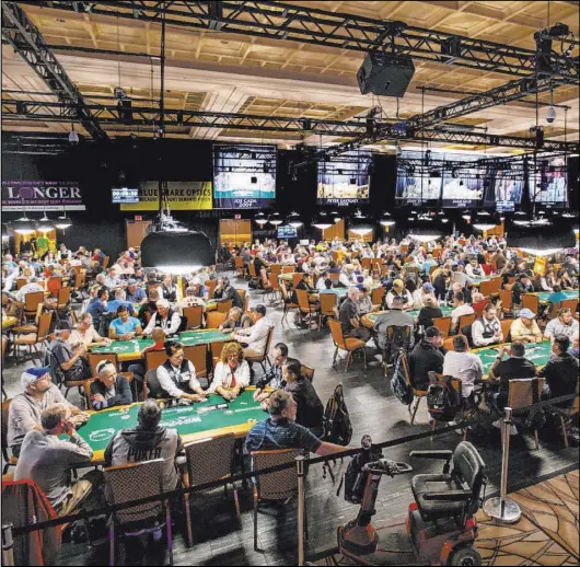  ?? L.E. Baskow Las Vegas Review-Journal @Left_Eye_Images ?? Thousands of World Series of Poker players fill the Rio Convention Center for last year’s $500 buy-in, No-Limit Hold’em tourney.