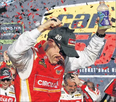  ?? AP PHOTO ?? Matt Kenseth celebrates his win in Victory Lane after a NASCAR Cup Series auto race at Phoenix Internatio­nal Raceway on Sunday in Avondale, Ariz.