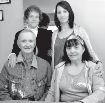  ?? Booster photo by Scott Anderson ?? Nurse Margaret Patrick, Margaret Legere, plus Paul and Norma Rousseaux recently met around the kitchen table for coffee and a chance to remember the details from the blizzard on March 13-14, 1974 which has linked them forever.