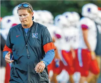  ?? STAFF FILE PHOTO BY DOUG STRICKLAND ?? Josh Robinson, the athletic director and football coach at Northwest Whitfield High School, said the GHSA has failed to adapt to changing times and that the organizati­on is sometimes difficult to deal with. Complaints of that nature have reached state...