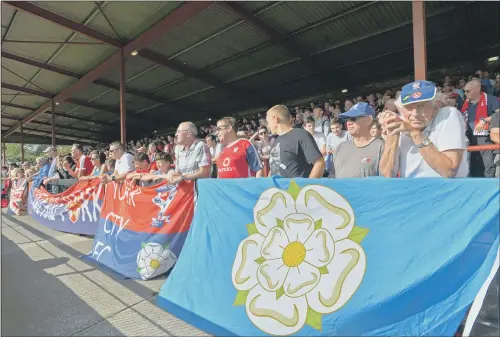  ?? PICTURE: BRUCE ROLLINSON ?? KEEPING THE FAITH: York City fans pictured at yesterday’s National League North home defeat to FC United of Manchester.