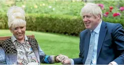  ??  ?? Prime Minister Boris Johnson has a cup of tea with television actress Dame Barbara Windsor during a meeting in London on September 2, 2019. They met at 10 Downing Street to discuss dementia care.