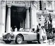  ??  ?? Heyday: an Aston Martin pulls up outside the Carlton, in 1955