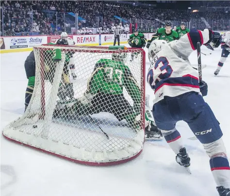  ?? BRANDON HARDER ?? A wraparound goal by Sam Steel helped the Regina Pats assume a 4-1 lead over the Prince Albert Raiders on Saturday. But then the Pats collapsed and needed overtime to pull out a victory that had earlier seemed inevitable.