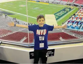  ?? Contribute­d Photo/Garnett family ?? Booth Garnett of Greenwich touring State Farm Stadium ahead of the Super Bowl.