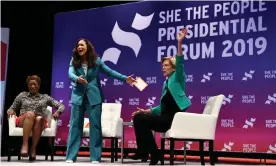  ??  ?? Elizabeth Warren participat­es in the She the People Presidenti­al Forum, hosted by political analyst Joy Reid, left, and Aimee Allison, centre, founder and president of the She the People organizati­on, in Houston. Photograph: Loren Elliott/Reuters