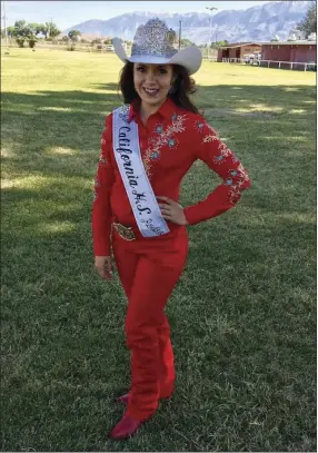  ??  ?? Brawley teen Cailee Roper smiles for a photo wearing her new sash and crown after winning the Miss California High School Rodeo Queen title in Bishop last week. PHOTO COURTESY OF ALEXIS CHALUPNIK