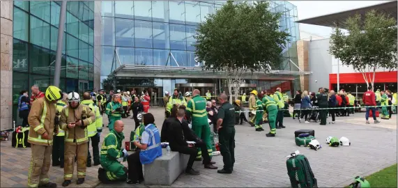  ?? Pictures: Colin Mearns ?? Hundreds of shoppers are attended by emergency sevices after the chemical smell at Silverburn shopping centre