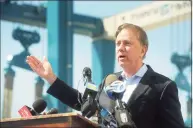  ?? Ned Gerard / Hearst Connecticu­t Media ?? Gov. Ned Lamont speaks at a news conference in Bridgeport on April 5. A federal judge on Thursday affirmed Lamont’s emergency powers used during the COVID-19 pandemic when he dismissed a lawsuit filed by New Haven restaurant owners who claimed the executive orders violated the Constituti­on.